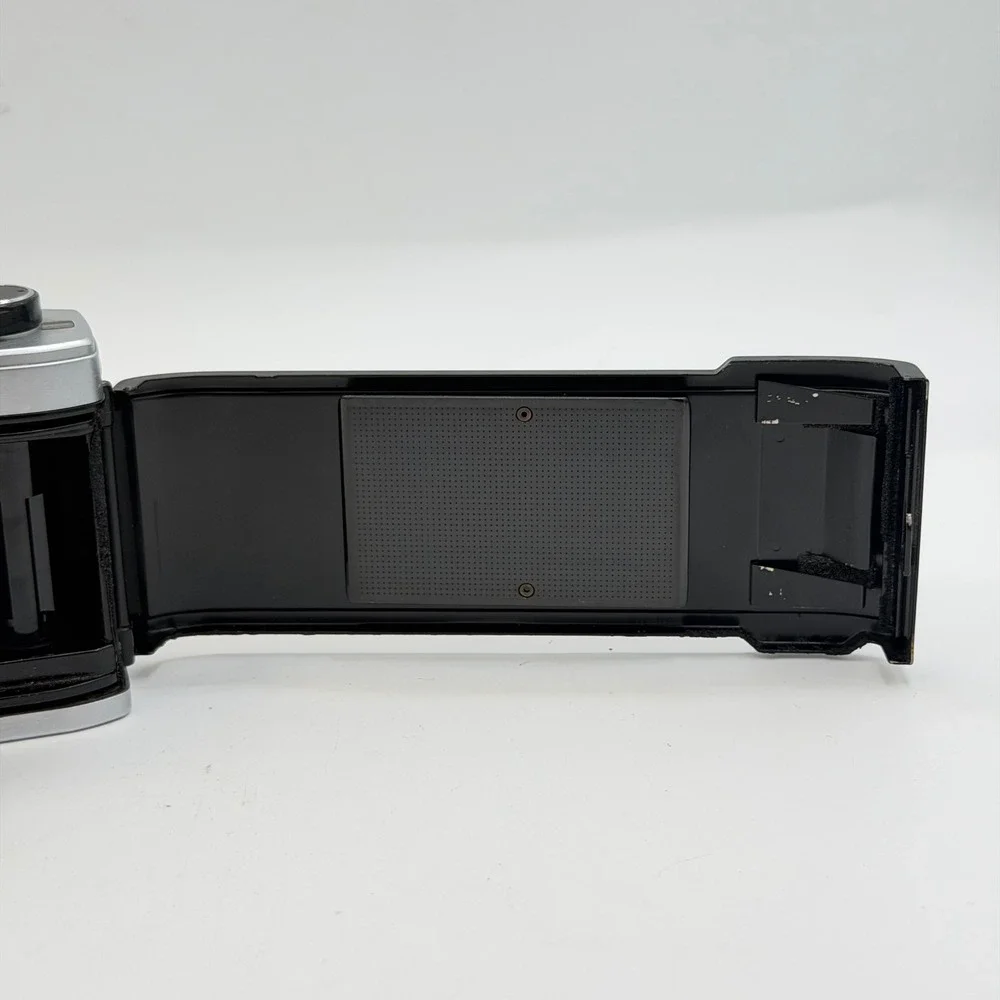 Olympus OM10 35mm Film SLR Camera Body Silver Black with Manual Adapter TESTED